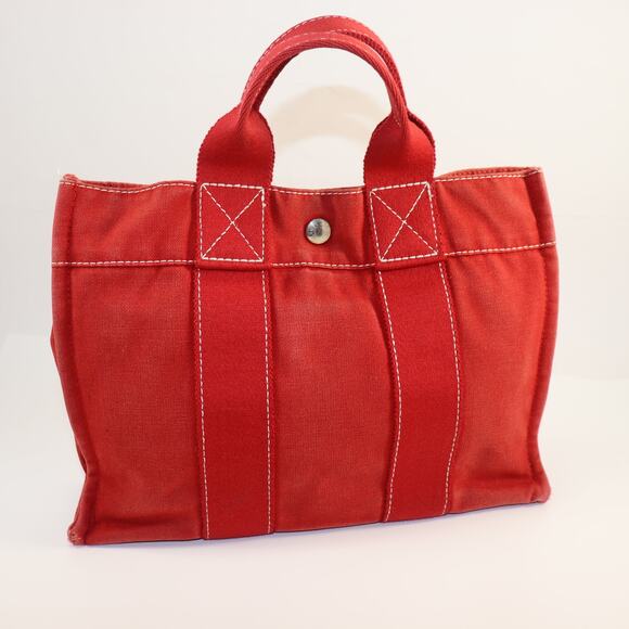 Hermès Red Canvas Small Tote Bag – Classic French Luxury with Snap Closure - Picture 1 of 8